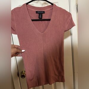 Pink casual shirt very stretchy. 
Normal wear